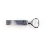 Agate stone bottle opener on a white background.