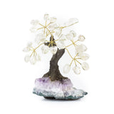 Small Crystal Quartz bonsai tree with tumbled clear quartz leaves on raw amethyst base.