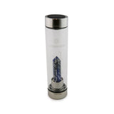 Libra Laterra Gemstone Water Bottle with lapis lazuli crystal attachment inside clear glass bottle on white background.